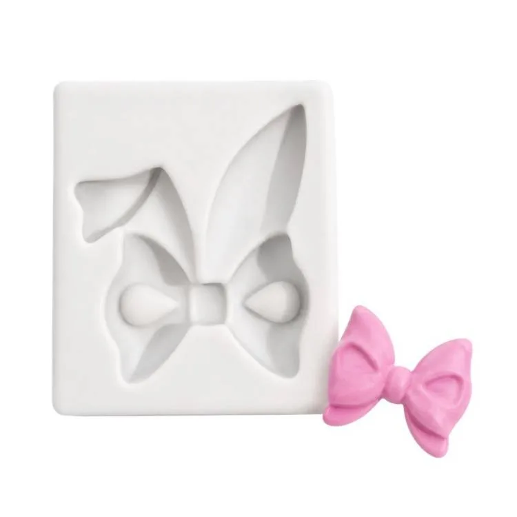 Silikonová forma Uši zajíce s mašlí 4,8 × 4 cm – Cesil