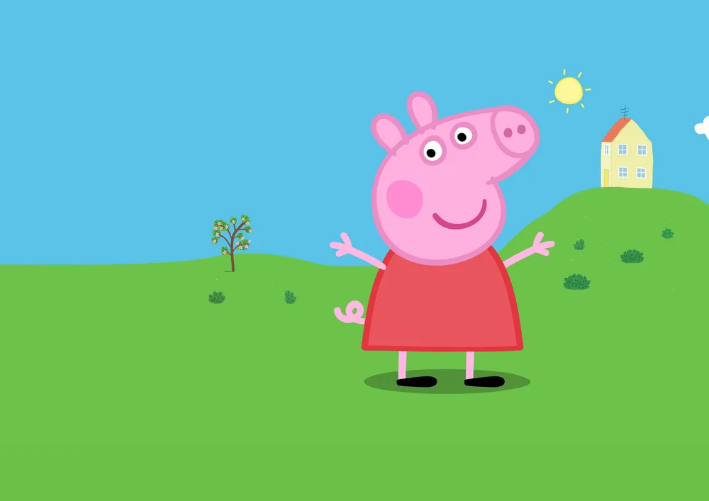 Prasátko Peppa – Peppa na zeleném kopci s domečkem – jedlý papír na hranatý dort – jedlý obrázek na dort